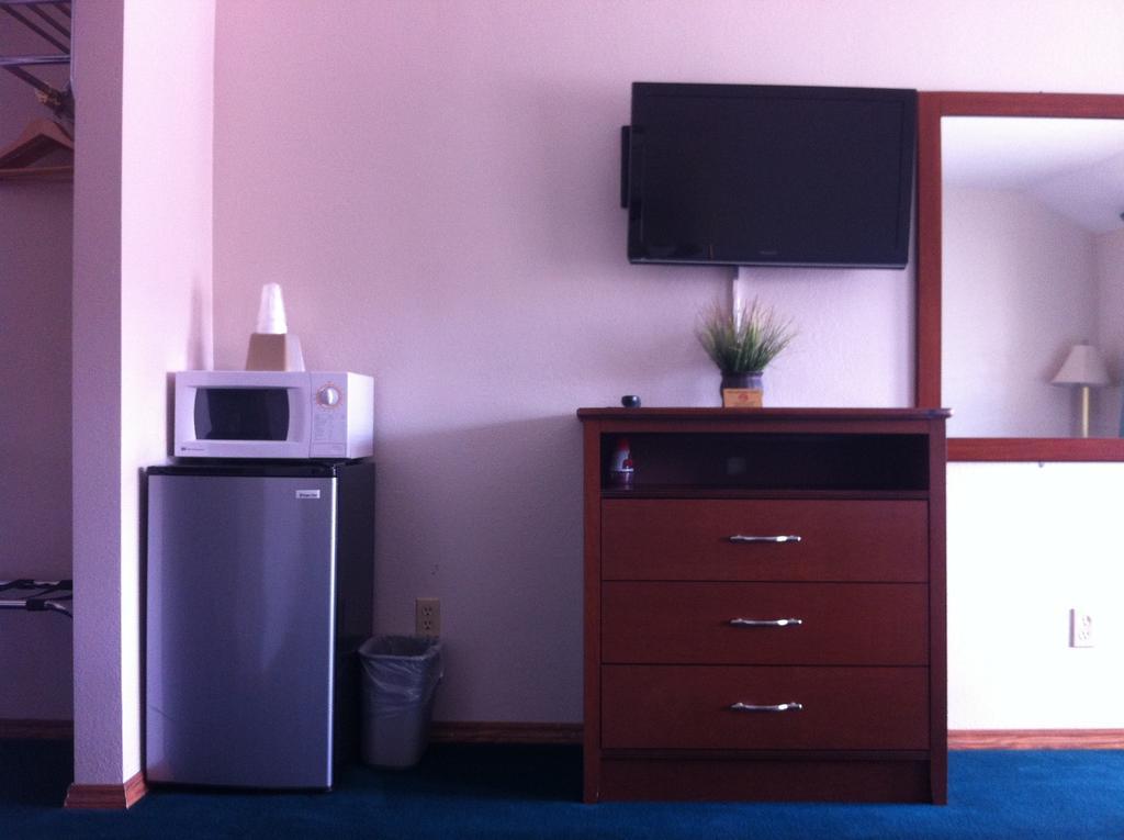 Legacy Inn Price Quarto foto