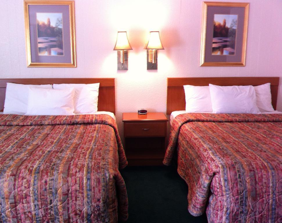 Legacy Inn Price Quarto foto