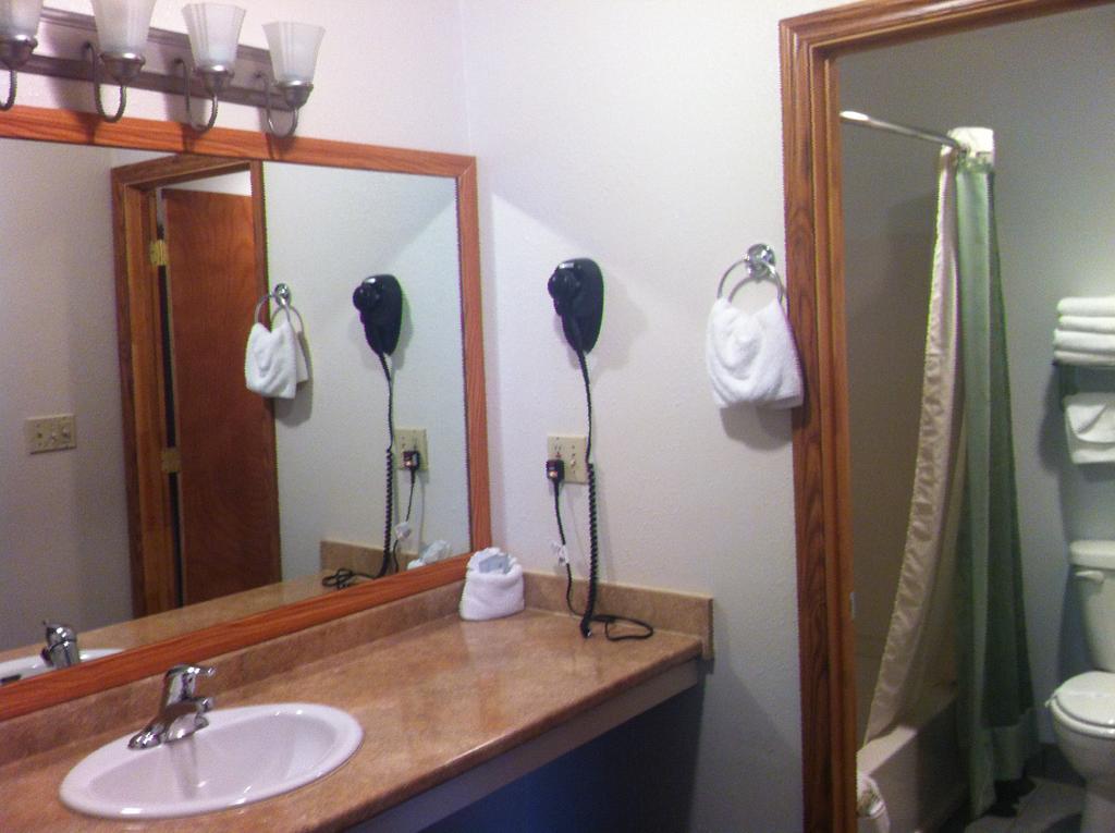 Legacy Inn Price Quarto foto
