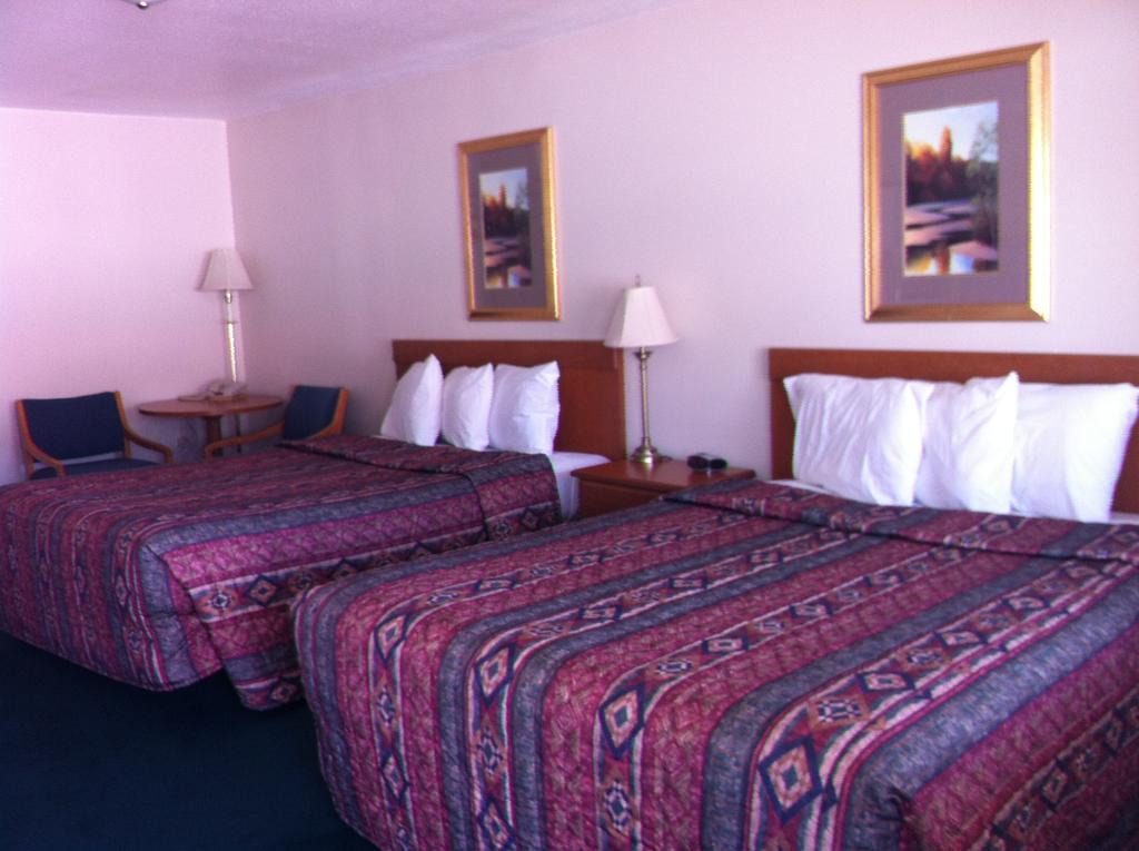 Legacy Inn Price Quarto foto