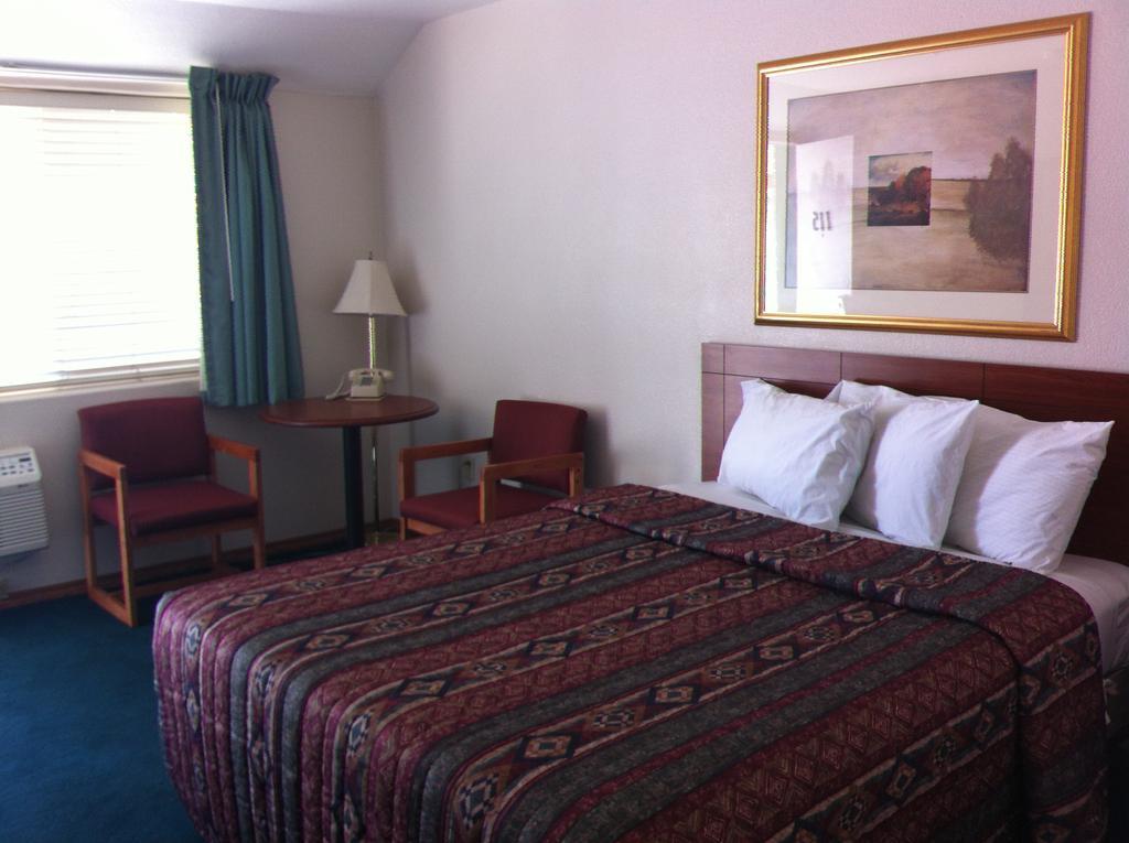 Legacy Inn Price Quarto foto